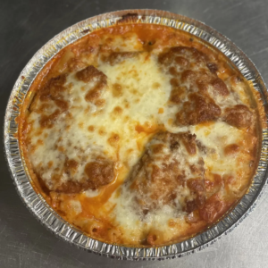 Eggplant alla Parmigiana Dinner with marinara sauce and melted mozzarella cheese, served with a choice of spaghetti, ziti, or gluten-free ziti.