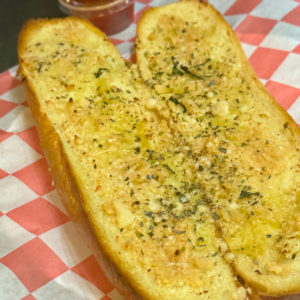 Garlic bread slices with a golden, crispy crust and a soft interior.