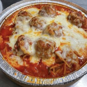 Homemade Meatball alla Parmigiana Dinner with marinara sauce and melted mozzarella cheese, served with a choice of spaghetti, ziti, or gluten-free ziti.