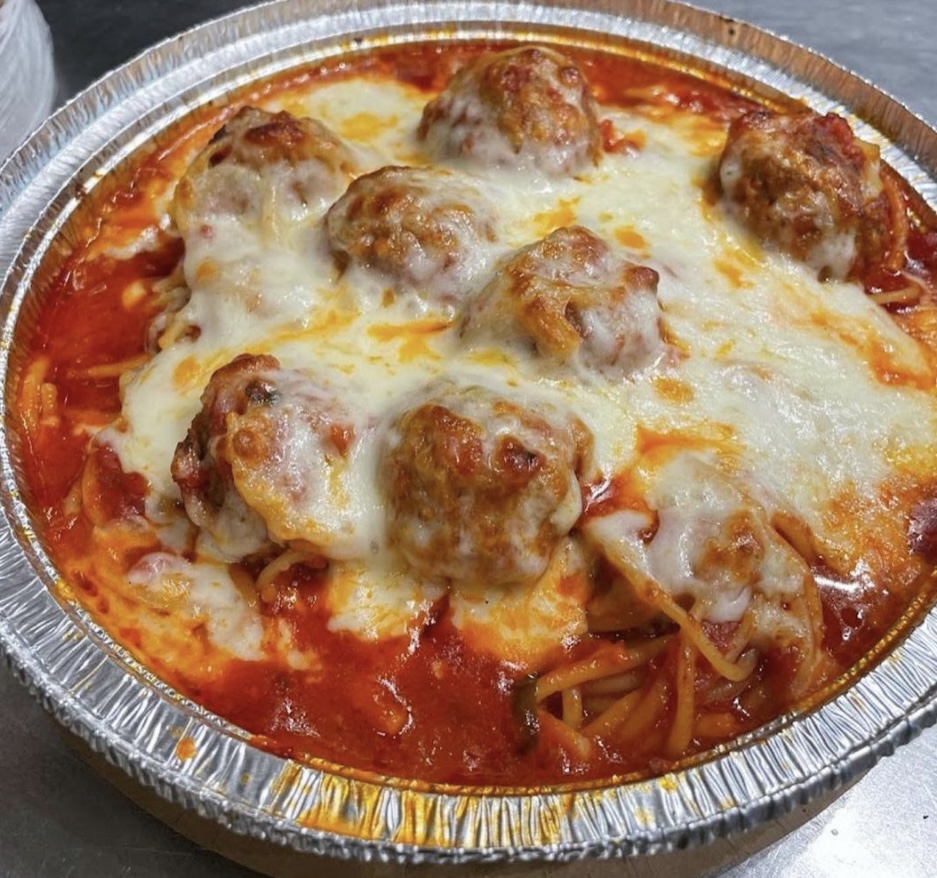 Homemade Meatball alla Parmigiana Dinner with marinara sauce and melted mozzarella cheese, served with a choice of spaghetti, ziti, or gluten-free ziti.