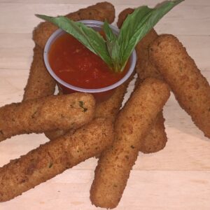 Mozzarella sticks with a side of marinara sauce.