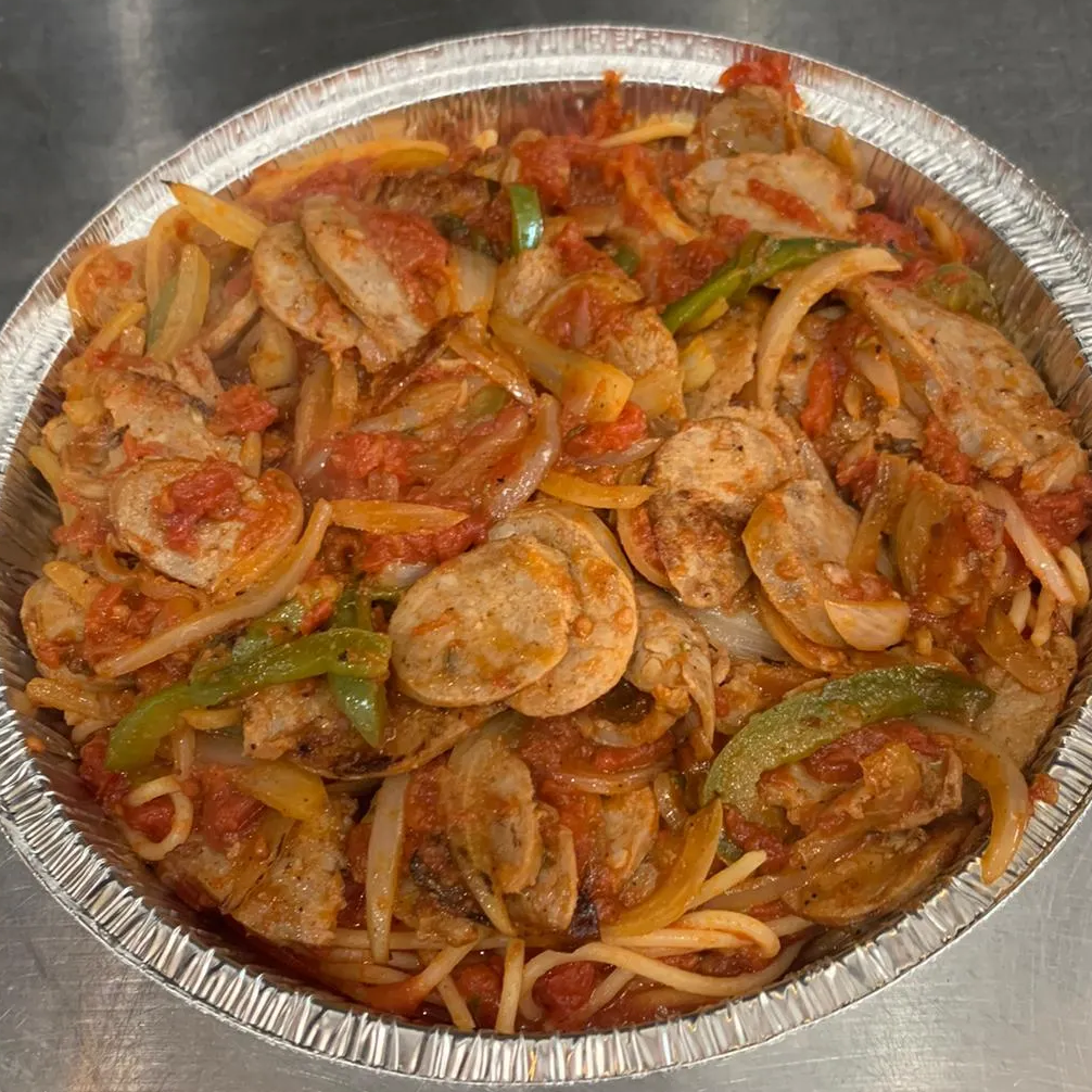 Sausage and Peppers Dinner with sautéed green and red peppers, served with a choice of spaghetti, ziti, or gluten-free ziti.
