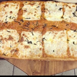 A Vodka Pie with fresh mozzarella, rich vodka sauce, and a sprinkle of parmesan.